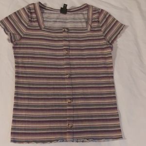 A colorful patterned shirt from the ArtClass brand